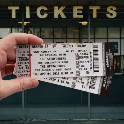 Pair of Tickets in front of a ticket window